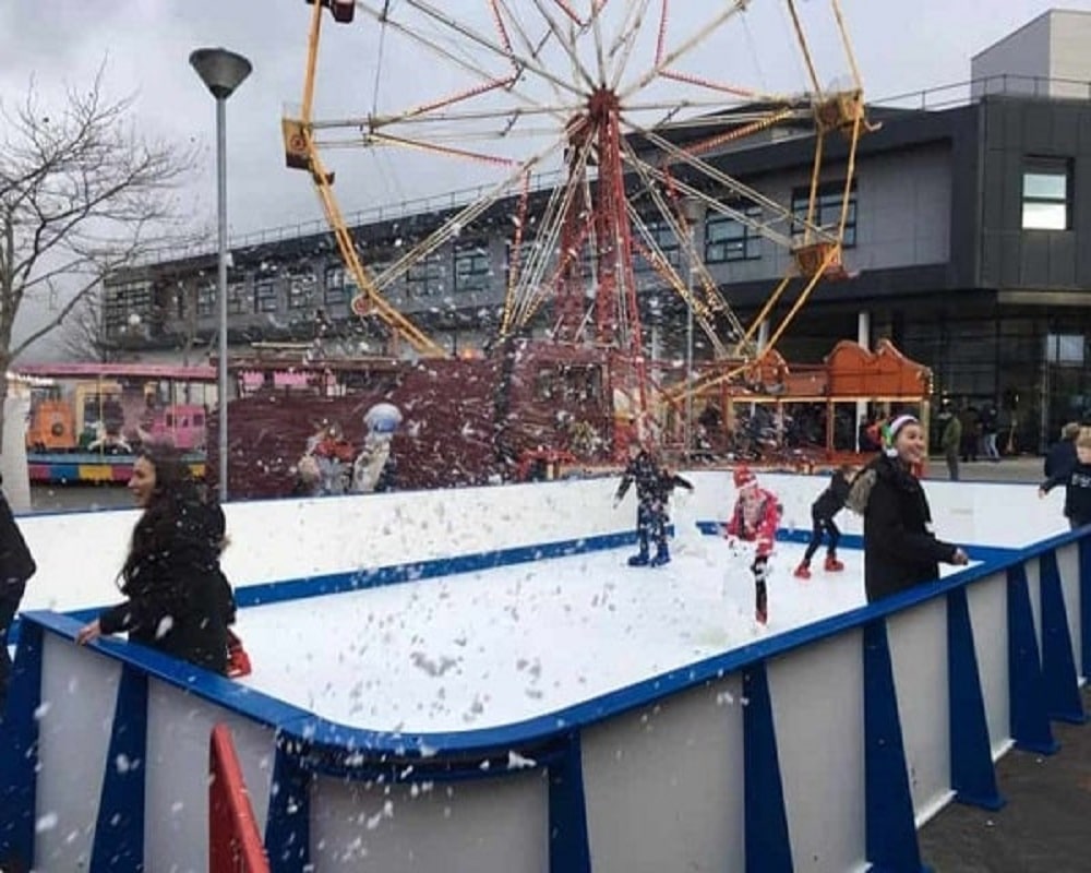 kids are enjoying synthetic ice rink hire in London